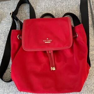 kate spade Red Nylon Drawstring Backpack with Flap and Gold Hardware